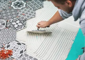 Pose de carrelage par nos équipes.